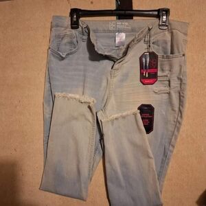 No Boundaries, mid rise light blue skinny jeans.